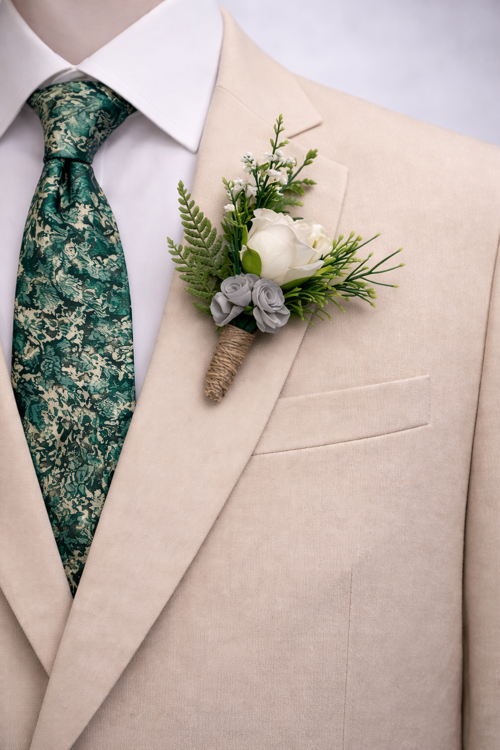 emerald green tie with white rose boutonniere on beige suit groom wedding accessory set”