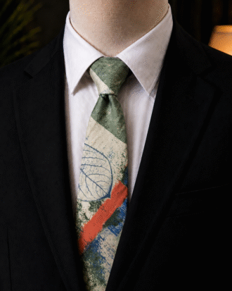 Akin Sage Green Abstract men’s necktie featuring a sage green colour and abstract pattern.